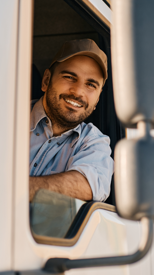 man smiling in truck