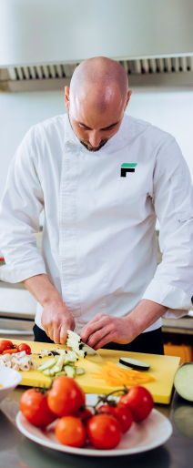 chef cutting vegetables